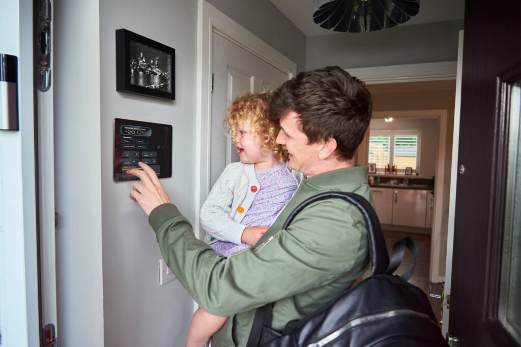 Australian household comparing electricity plans and rates on a laptop