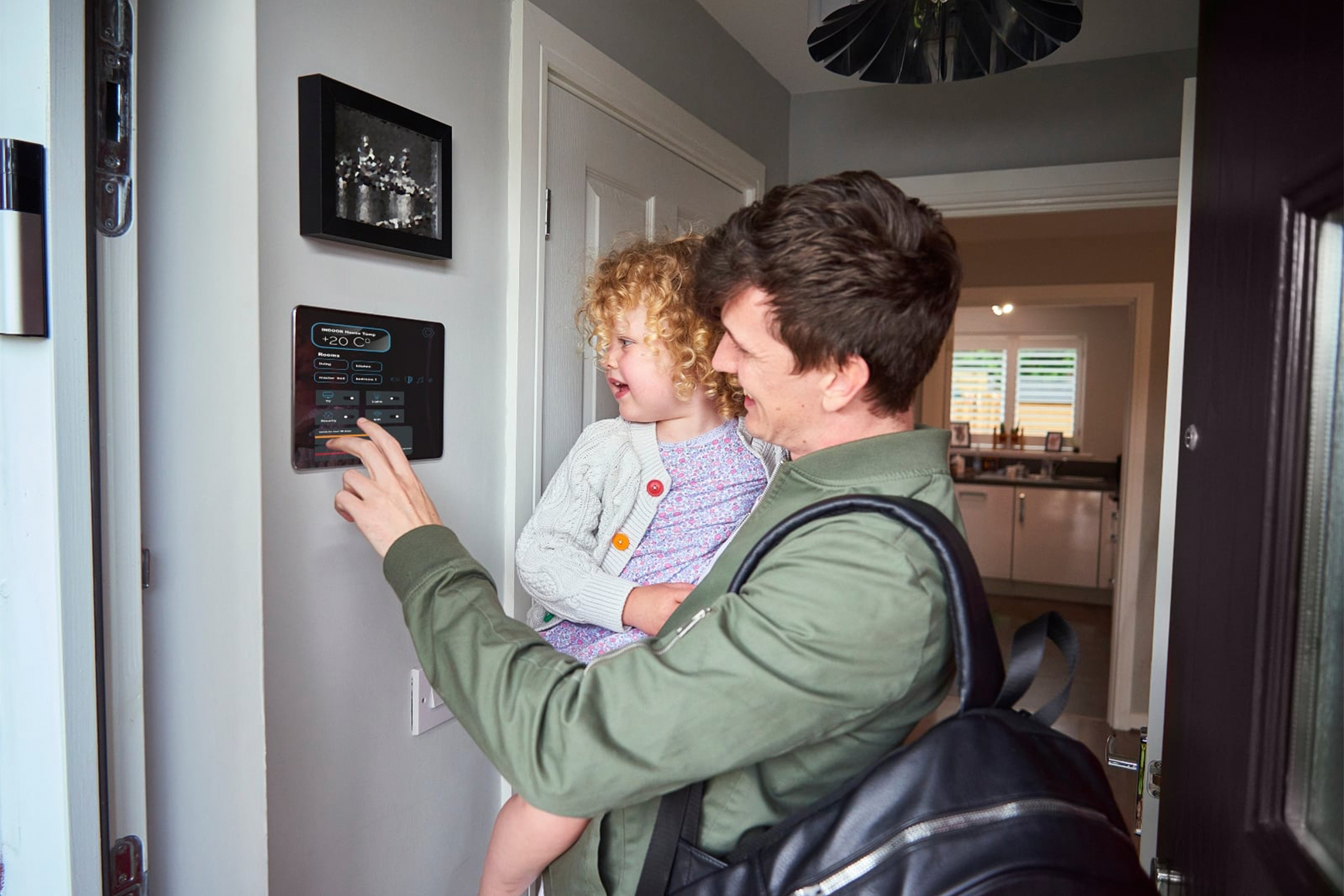 Australian household comparing electricity plans and rates on a laptop